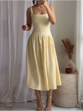 Zara Soft Yellow Backless Midi Dress new w tags.